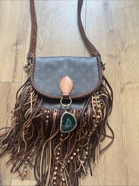 Worn a few times Vuitton Brown Fringe Crossbody with Agate Charm refurbished